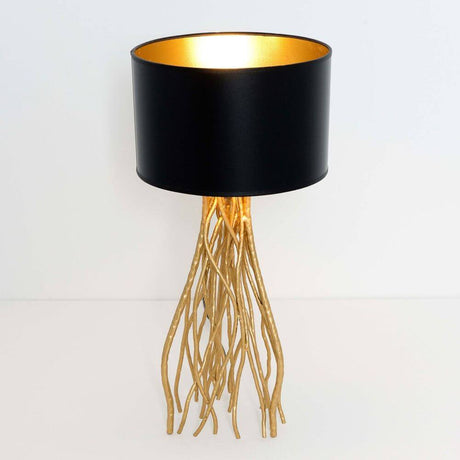 Lampada da tavolo Capri Mittel in metallo oro-nero con attacco dorato e paralume nero.