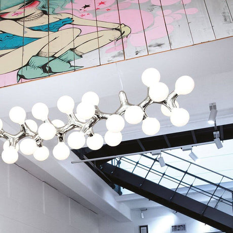 DNA Quattro-9.1 pendant light black with modern bulbs in stylish interior design.
