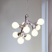Suspension DNA Quattro-9.2 en cuivre avec des sources lumineuses simples et rondes en forme organique.
