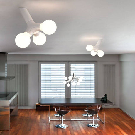 DNA Single-3 ceiling & wall lamp copper in modern living space with stylish design and warm light.