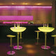 Moderne Lounge mit Moree LED Tischen, bunten Lichtern und stylischen Stühlen in trendiger Bar-Atmosphäre.