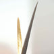 Stehleuchte Palustre Eisen Braun-Schwarz-Gold elegante Lichtquelle für modern eingerichtete Räume.