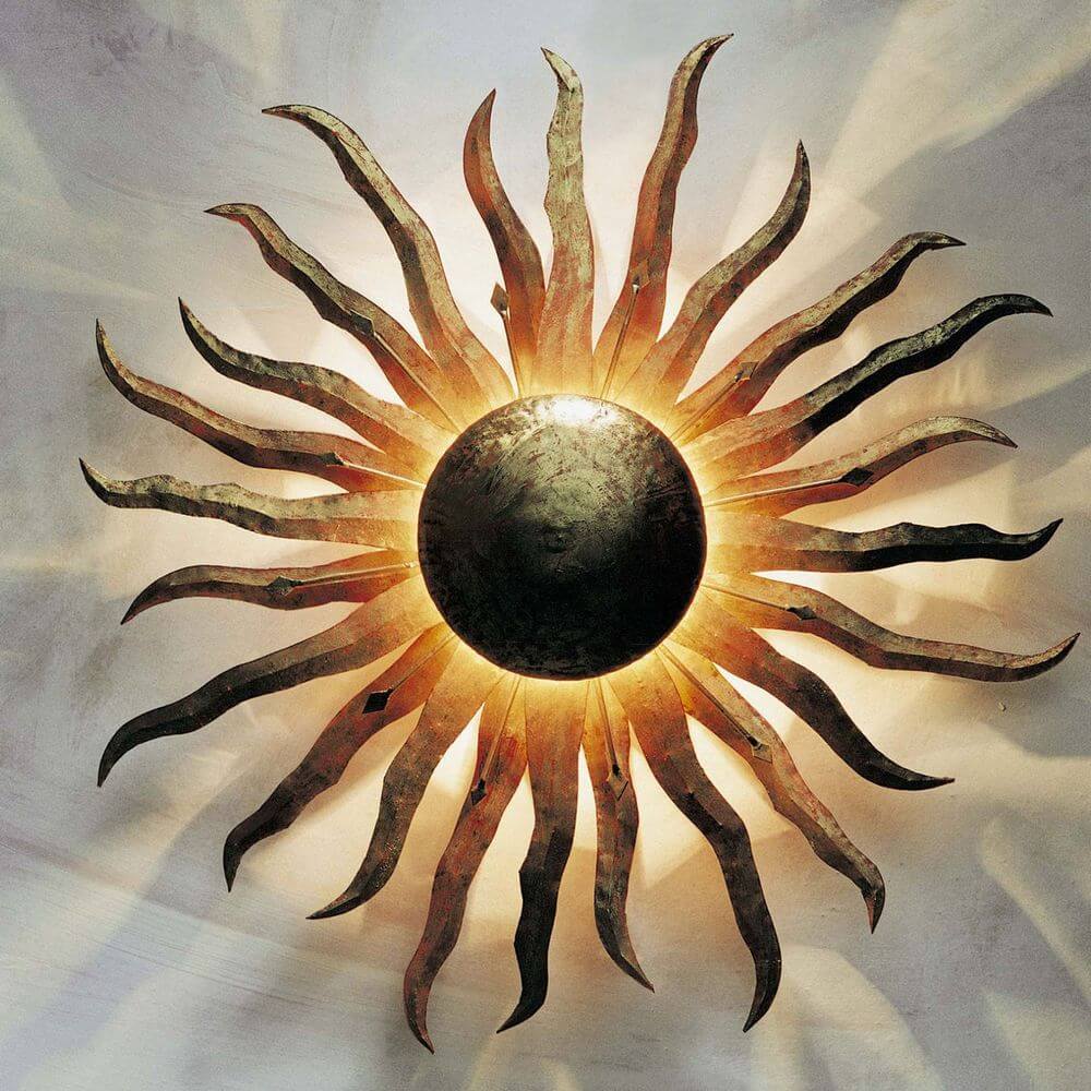 Wandleuchte 2-flammig Sonne Grande Eisen Gold - dekorative Wandlampe mit Sonnenmotiv in Gold und Eisen.