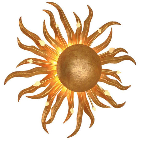Aplique de pared Sonne Piccola de hierro dorado con diseño de sol dorado y rayos luminosos al fondo.