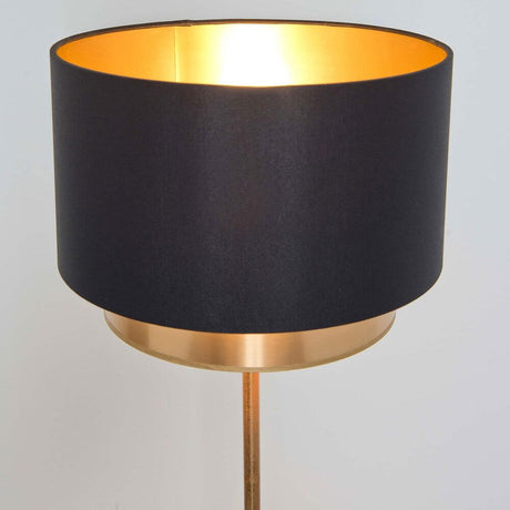 Golvlampan Mattia Rund Iron Gold-Svart med svart lampskärm och guldfärgad insida