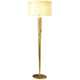 Innovazione gulvlampe i jern og gull med et elegant gyllent design og lys lampeskjerm.