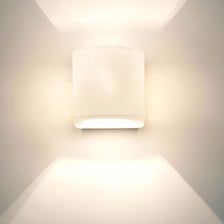 Aplique de pared Punto hierro dorado, elegante aplique de pared de diseño moderno con luz suave.