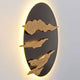 Wandleuchte Firmamento Eisen Braun-Schwarz-Gold mit stilvollem Lichtdesign und modernem Look.
