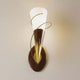 Wandleuchte Torcia Spirale Eisen-Glas Braun-Schwarz-Gold mit modernem Design und goldenen Akzenten