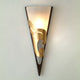 Wandleuchte Ondulata Eisen-Glas Braun-Schwarz-Gold mit elegantem Design und goldenen Details.
