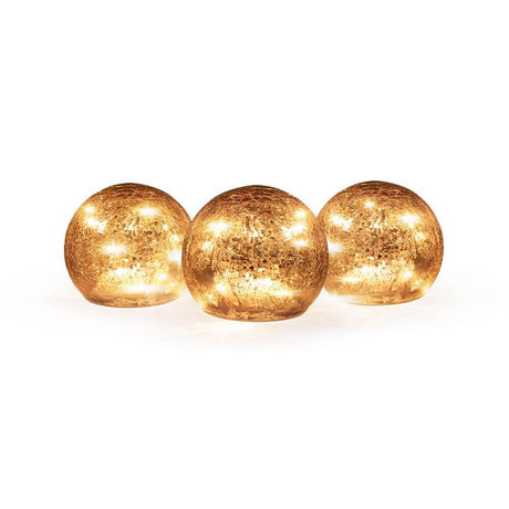 3-piece set LED Lua Christmas baubles Ø 10 cm in golden colors with warm light for festive decoration.
