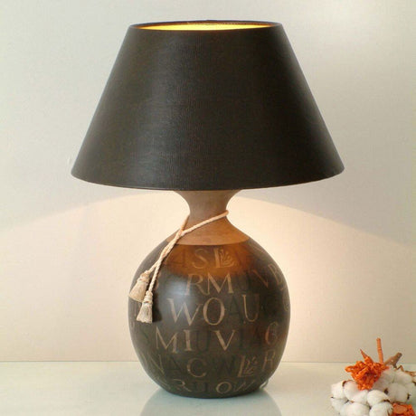 Table lamp Carattere Grande ceramic black-brown-sand with a black lampshade and artistic design.