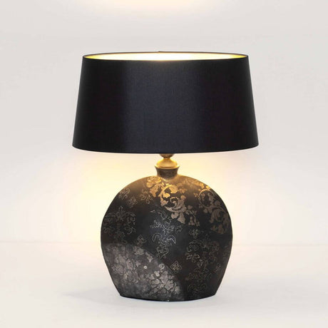 Table lamp Mary Oval Small Ceramic Black-Gold-Silver with black lampshade and decorative ceramic base.