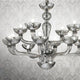 Candelabro in vetro soffiato Casanova 90cm cromo, trasparente con design elegante e dettagli artigianali in metallo.