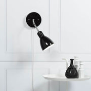 Cyclone wall light black with flexible arm and lampshade, practical lighting for any room.