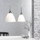 Read 2 Pendelleuchte in opalweißem Glas über einem modernen Esstisch, stilvolles Design von Nordlux.
