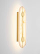 Aider Wandleuchte 3000K in elegantem Design mit warmem Licht und goldenen Akzenten.