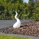 Alien XL Outdoor Stehlampe 111cm IP44 Liquid-Light Weiß in einem Garten, modern und elegant