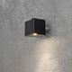 Schwarze Amalfi LED Außen-Wandleuchte mit Trafo 12V, modern an einer grauen Wand montiert.
