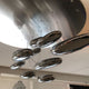 Artemide Mercury Sospensione LED Hängelampe mit futuristischen Lichtsteinen aus Chrom, Ø 110cm, stilvolles Design.