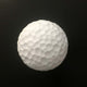 Weiße Golfball-Darstellung auf schwarzem Hintergrund, zeigt die typische, strukturierte Oberfläche.
