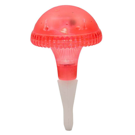 Assisi Mushroom Solar LED Rød lampe imiterer en svamp og skinner i rødt lys, ideel til haven eller terrassen.
