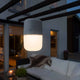 LED solar light Assisi for hanging or standing gray in the outdoor area at dusk.