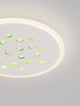 Astro LED Deckenleuchte 3000K Weiß mit dekorativen grünen Akzenten auf dem Lampenschirm.