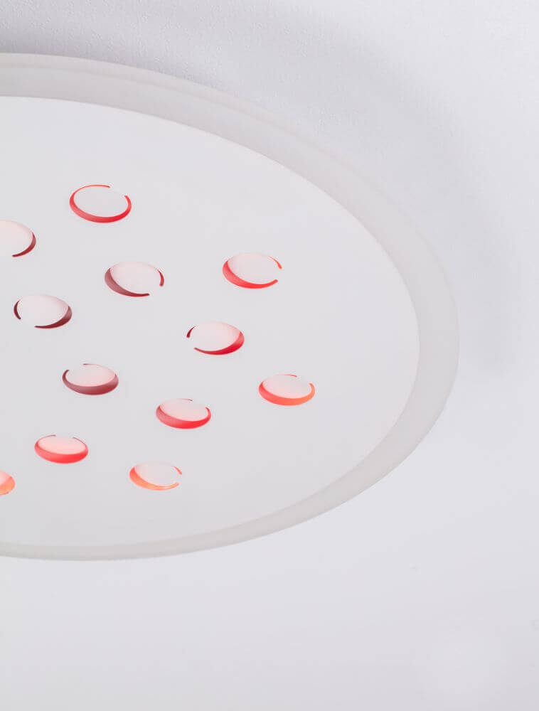 Astro LED Deckenleuchte 3000K Weiß mit farbigen Akzenten und modernem Design.
