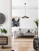 Aura Pendelleuchte Ø 61cm Rattan in modernem Wohnraum mit skandinavischem Design.
