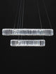 Aurelia LED Pendelleuchte Ø 60cm 2-flammig mit K5 Kristallen und Chromring für modernes Ambiente.