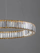 Aurelia LED Pendelleuchte Ø 60cm 3500K mit klarem K5 Kristall und goldenem Rahmen.