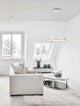 Aurelia LED Pendelleuchte Ø 60cm 3500K in modernem Wohnzimmer mit hellem Interieur.