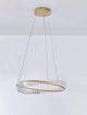 Aurelia LED Pendelleuchte 3500K Gold mit geometrischem Design und facettenreichen Glasstäben.