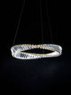 Aurelia LED Pendelleuchte 3500K Gold mit geometrischem Design und facettenreichen Glasstäben.