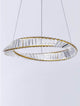 Aurelia LED Pendelleuchte 3500K Gold mit geometrischem Design und facettenreichen Glasstäben.