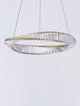 Aurelia LED Pendelleuchte 3500K Gold mit goldenen Ringen und facettenreichen Glasstäben, modernes Design.