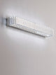 Aurelia LED Wandleuchte 3500K - verchromtes Metall mit K5-Kristallen, dekorative Wandlampe erzeugt funkelnde Reflexionen und warmweißes Licht
