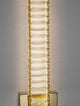 Aurelia LED Wandleuchte 3500K Gold mit glasklaren K5 Kristallen und elegantem Design.