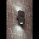 Außenwandlampe KLAMP 2-flammig IP44 Dunkelgrau an einer Steinwand montiert.