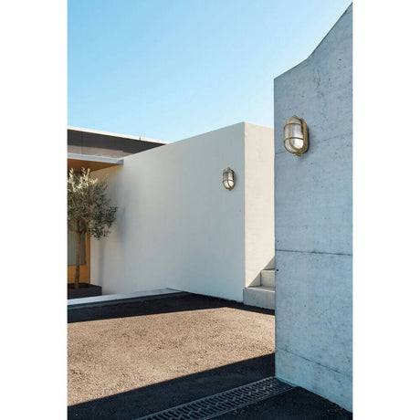 CABO outdoor wall light IP65 brass coastal lamp saltwater on a modern outdoor wall.