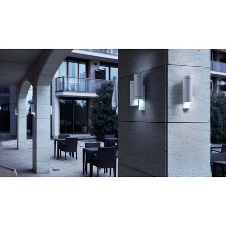 STEPS outdoor wall light IP44 White on a modern house wall in an elegant setting.