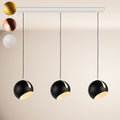 s.luce Ball Esstisch-Hängeleuchte mit drei schwarzen Kugeln, ideal für moderne Wohnräume.