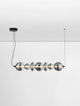 Bally LED Pendelleuchte 7-flammig in modernem Design mit matt schwarzem Aluminium und rauchgrauem Glas.
