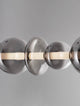 Bally LED Pendelleuchte 7-flammig aus matt schwarzem Aluminium und rauchgrauem Glas, elegantes Design.