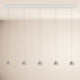 s.luce Beam LED Esstisch-Pendelleuchte Balken 120cm mit eleganten Pendellampen für moderne Innenräume.