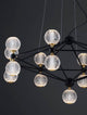 Belinda LED Pendelleuchte Ø 105cm 17-flammig mit geometrischem Design und Kristallkugeln.