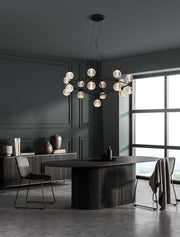 Belinda LED suspension Ø 105 cm à 17 lumières dans un intérieur moderne au design élégant.