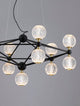 Belinda LED Pendelleuchte Ø 89cm 13-flammig mit geometrischem Design und eleganten Glaskugeln.