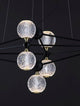 Belinda LED Pendelleuchte 9-flammig, modernes geometrisches Design mit stilvollen Glaskugeln.